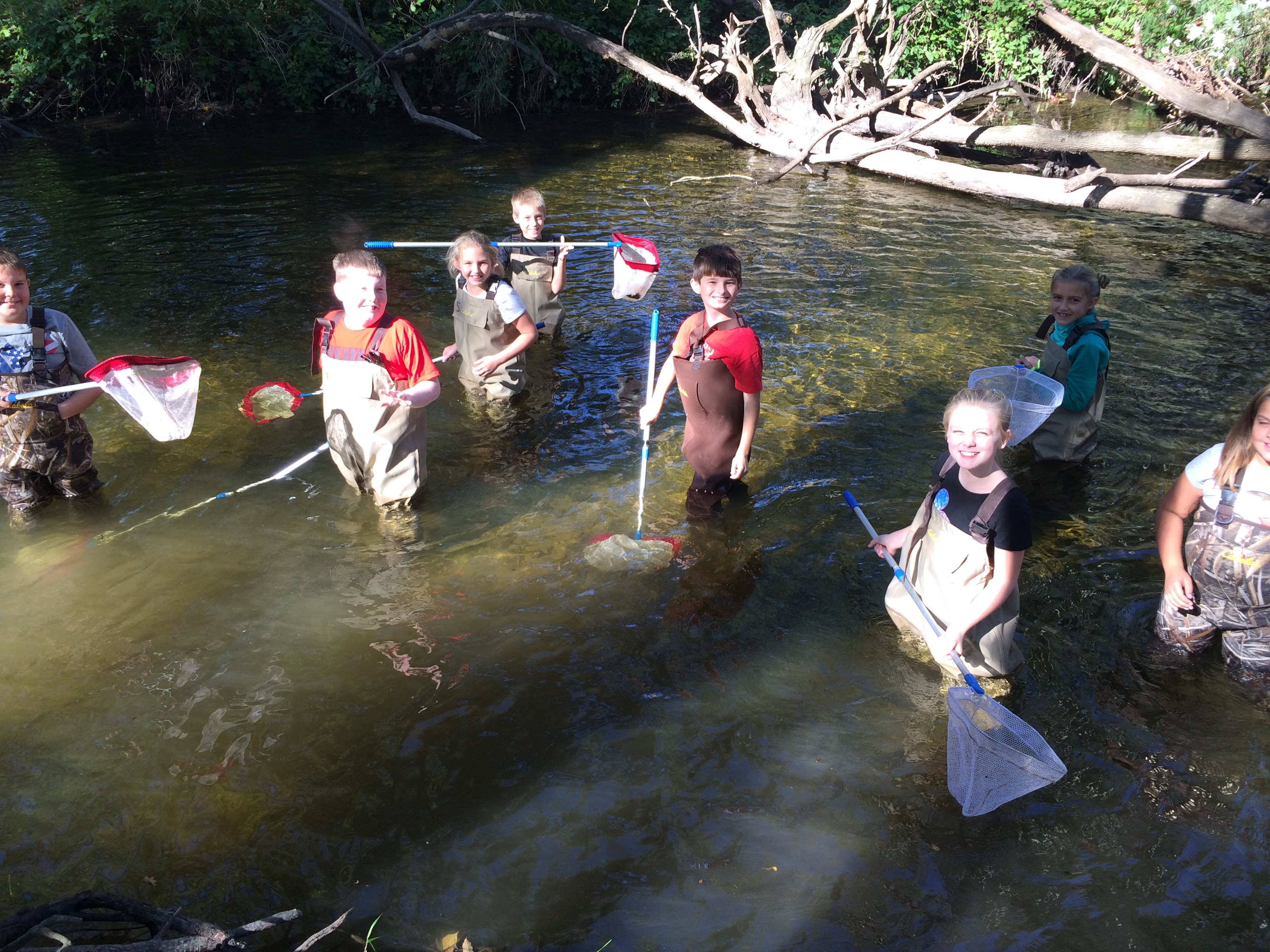 STEM Washington Academy, students doing various activities indoors and outdoors