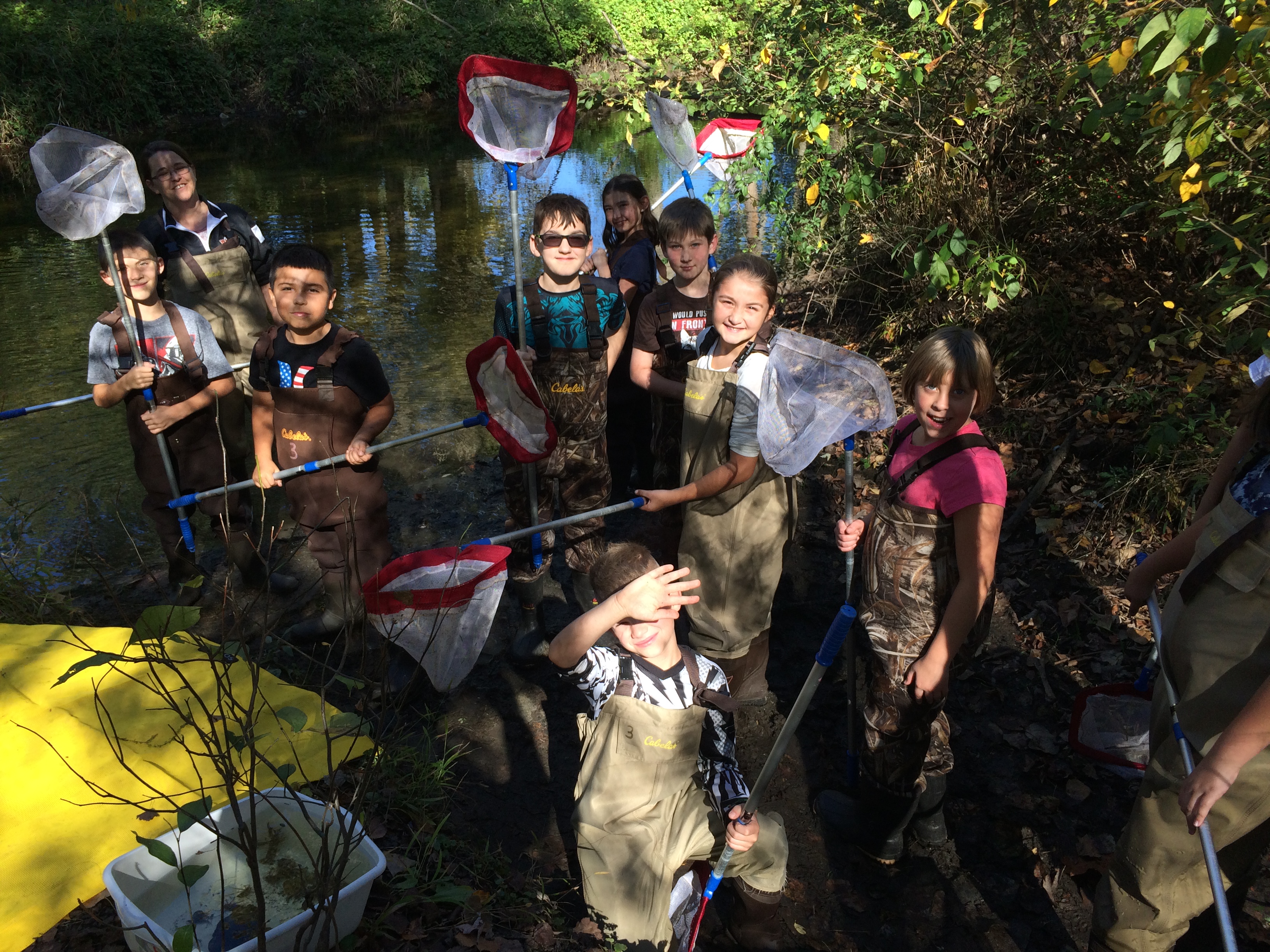 STEM Washington Academy, students doing various activities indoors and outdoors
