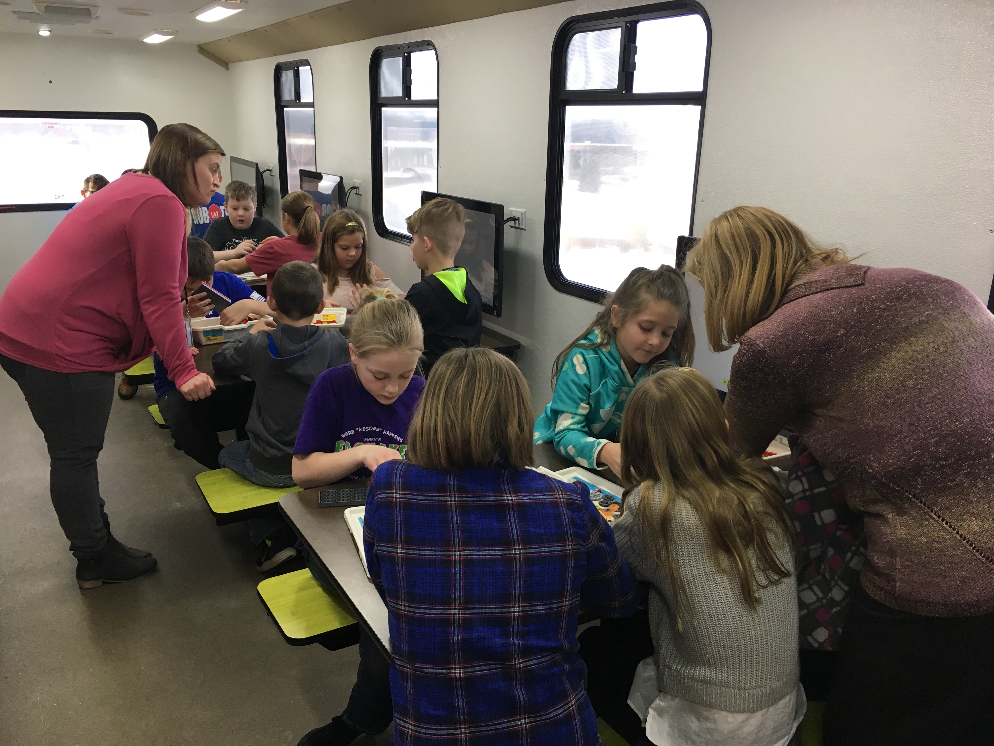 STEM Washington Academy, students doing various activities indoors and outdoors