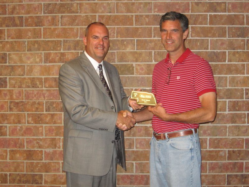 Dave Welsch receiving award
