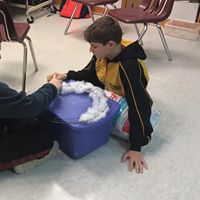 Member gluing some cotton to a cooler