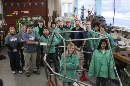 Casey, Freddy, Ed, Dustin, Ty, MRC, Dusty, Evan, Chris, Lupita, Bobbie. January 2010 build team receives a check from Cargill IBR