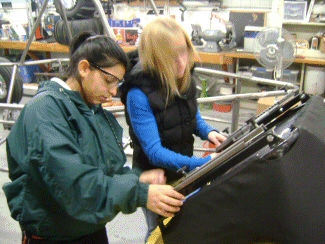Lupita and Bobbie installing the sliders