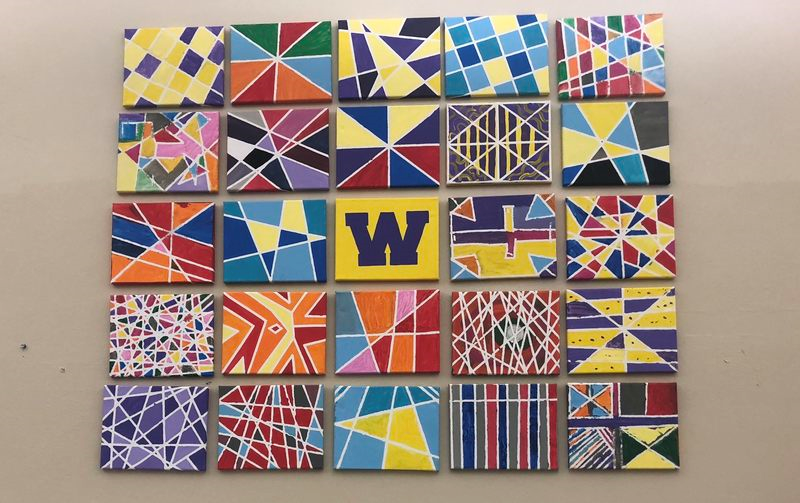 25 paintings made by the students for the school