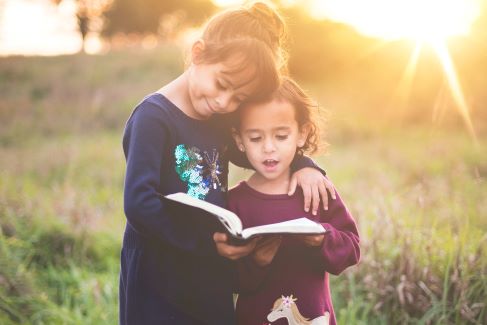 Children reading the bible