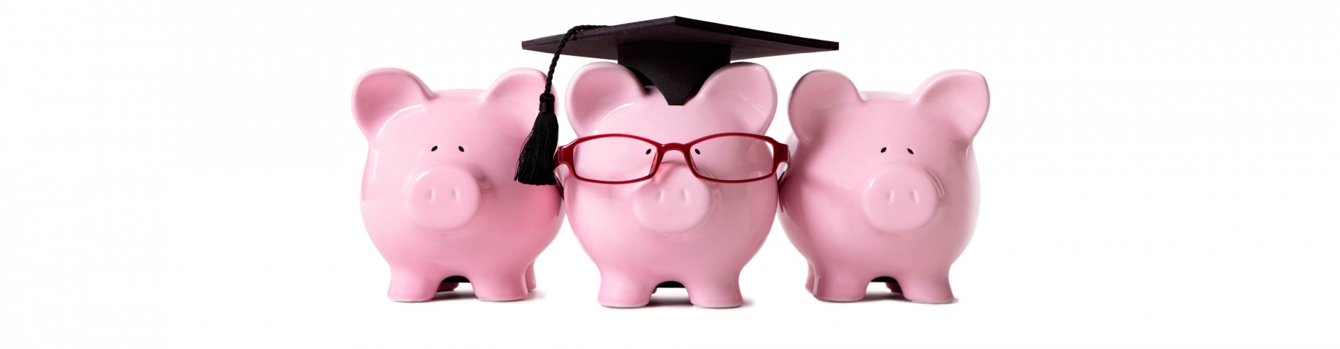 Three piggy banks, middle one has glasses and a graduation cap