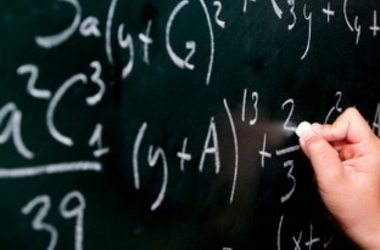 Math questions on a chalk board