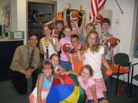 Mr. Lupisella and the Student Council get excited about some of the new playground equipment.