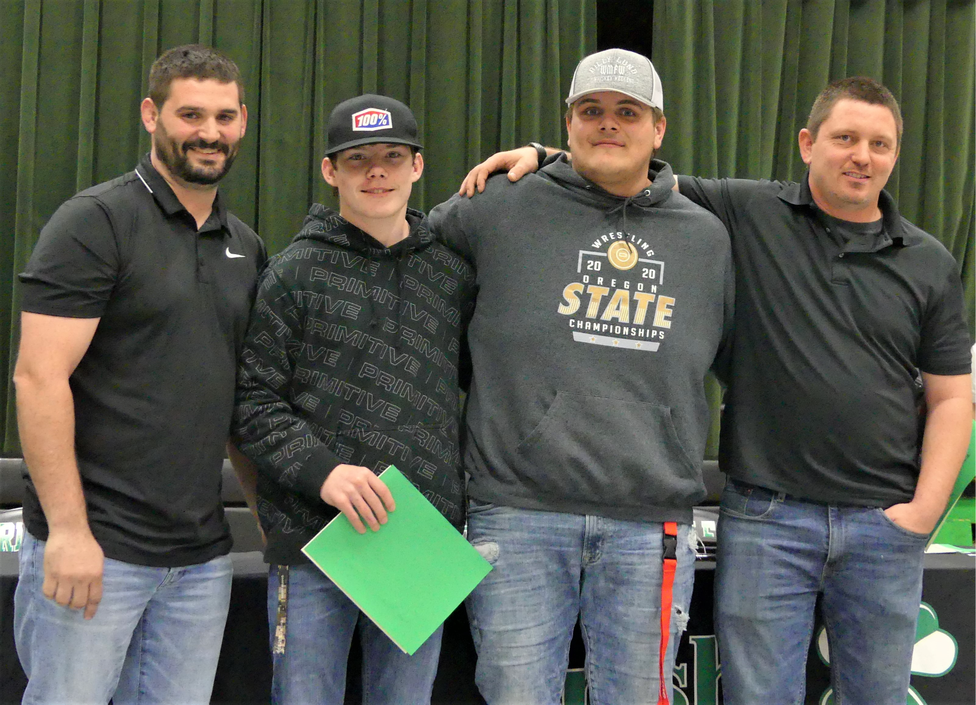 Wrestling coaches with Riddle wrestlers