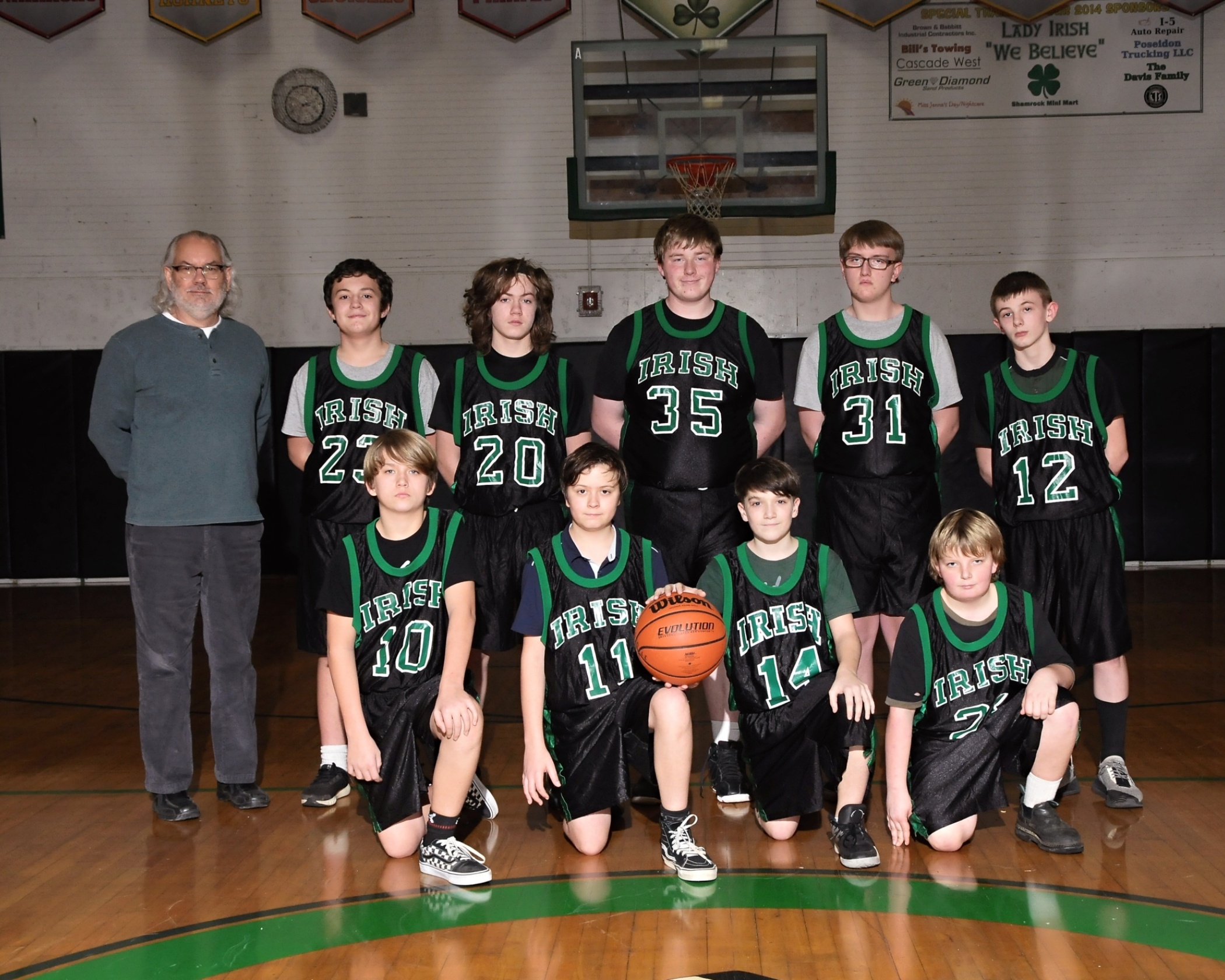 Riddle Junior High School boys basketball team photo.