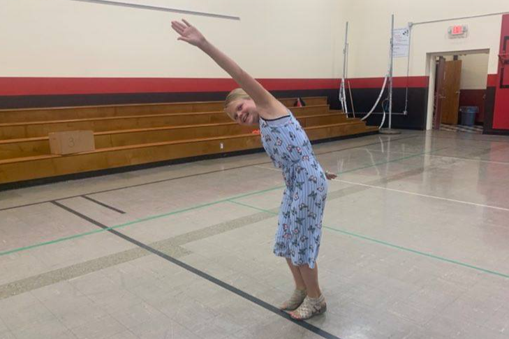 Camper having fun in the gym.