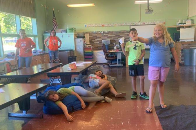 Campers practicing a skit.