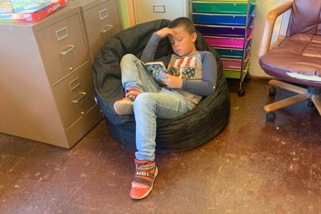 New Ventures Campers enjoy reading!