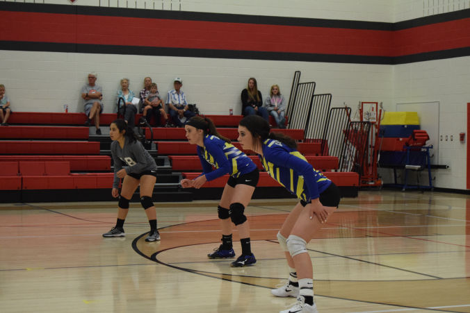 HIGH SCHOOL TEAM BACK ROW READY FOR A SERVE!!