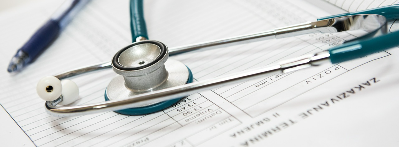 Stethoscope and a pen