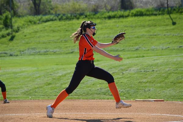 Student in a Softball game