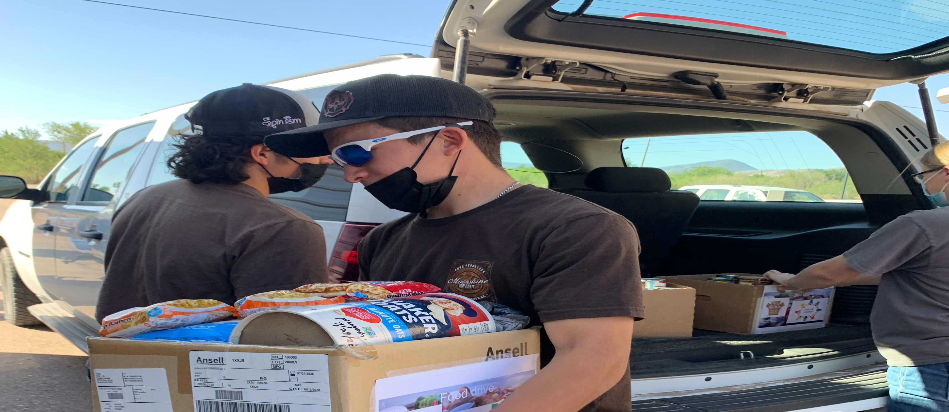 person carrying a box