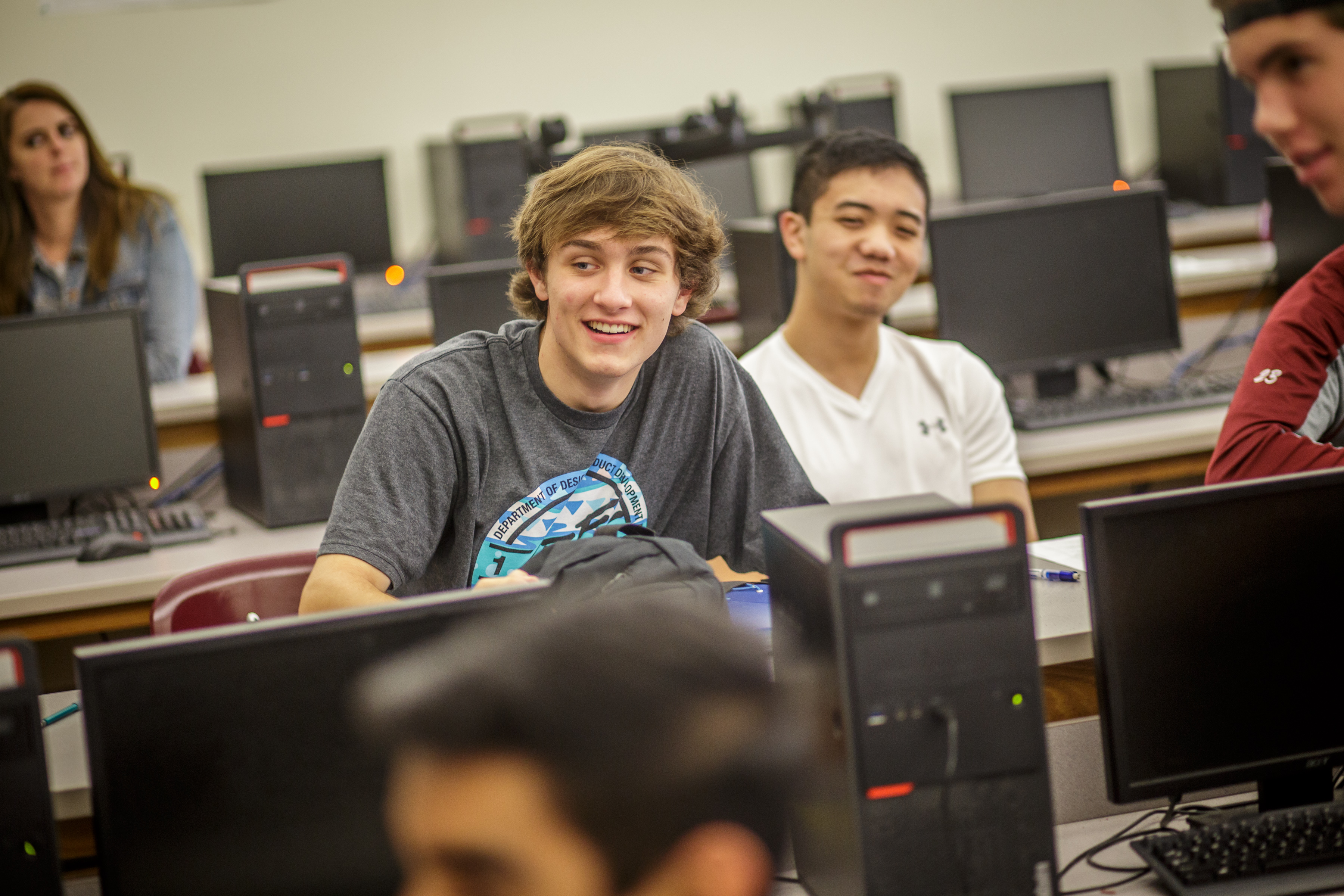 Students at a desk.