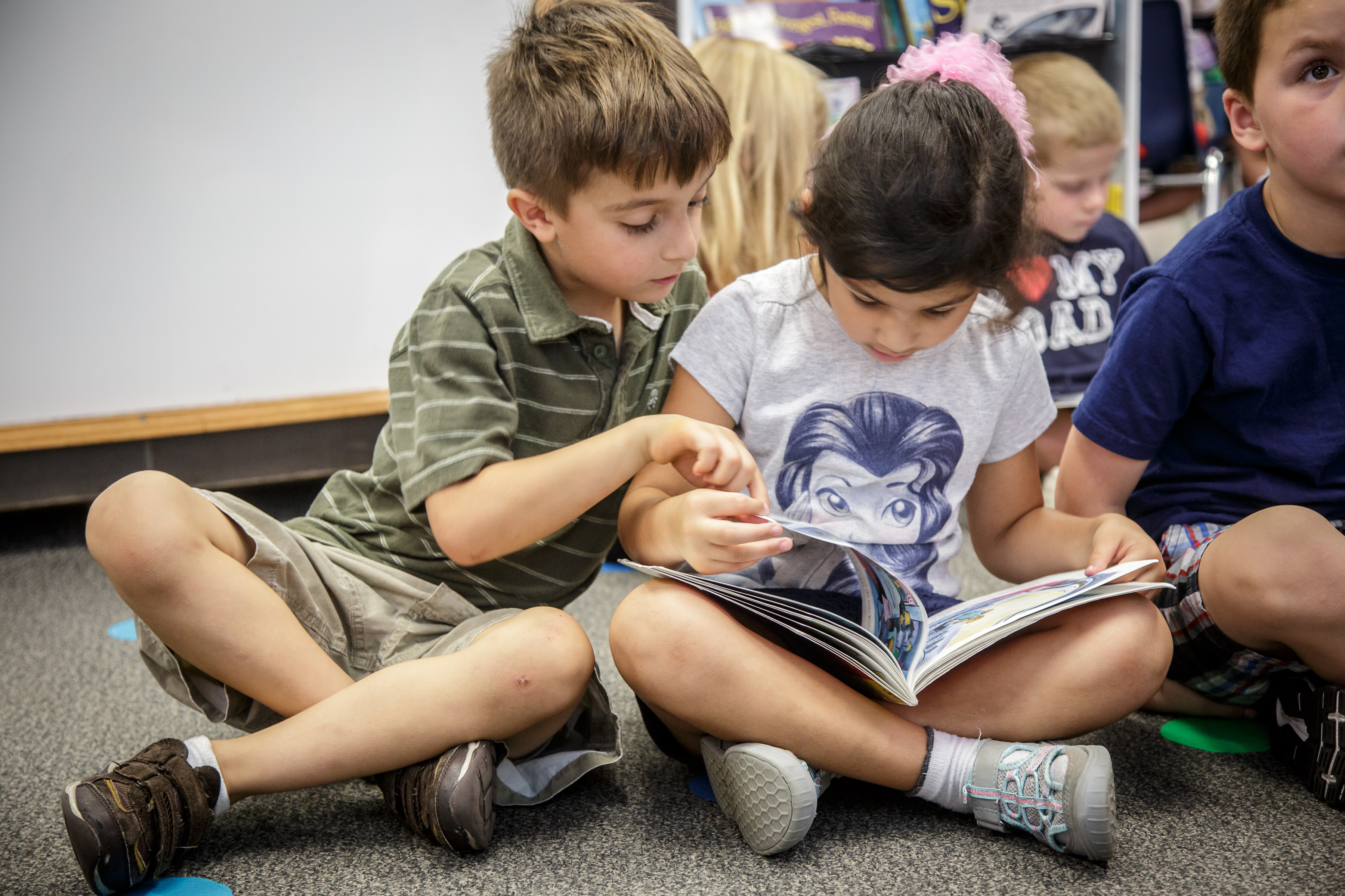Students reading books.