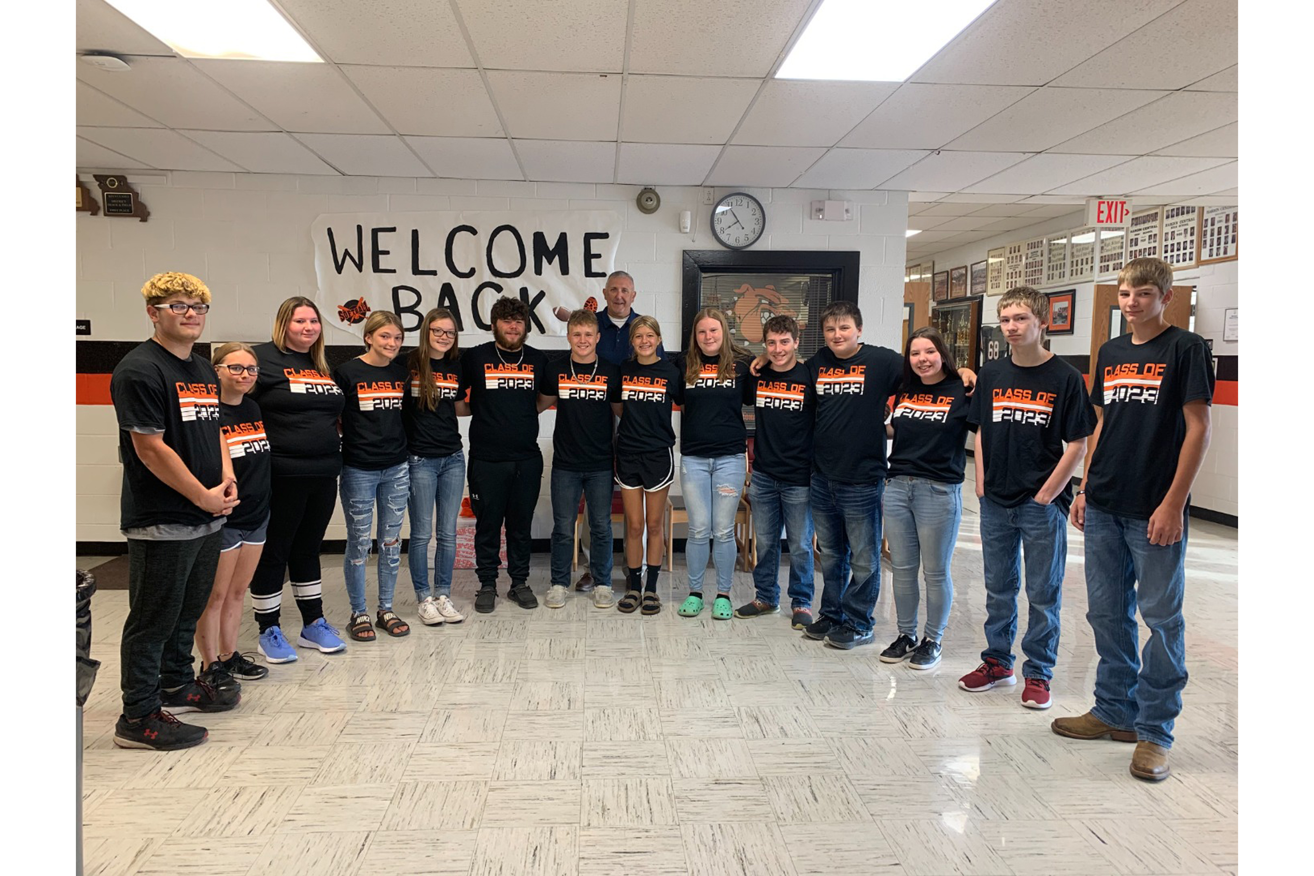 Welcome Back group picture of students wearing matching shirts