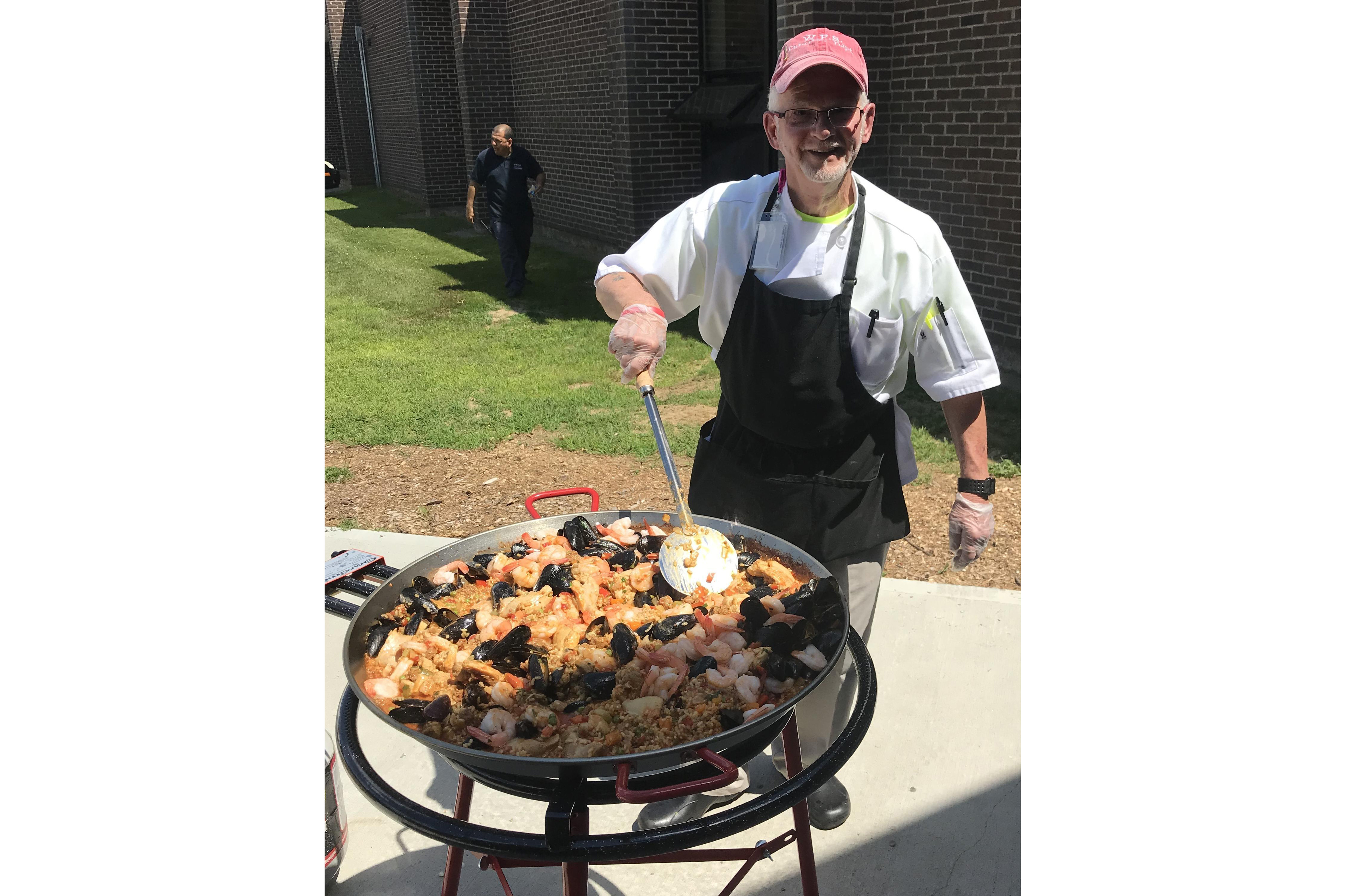 Man grilling outside