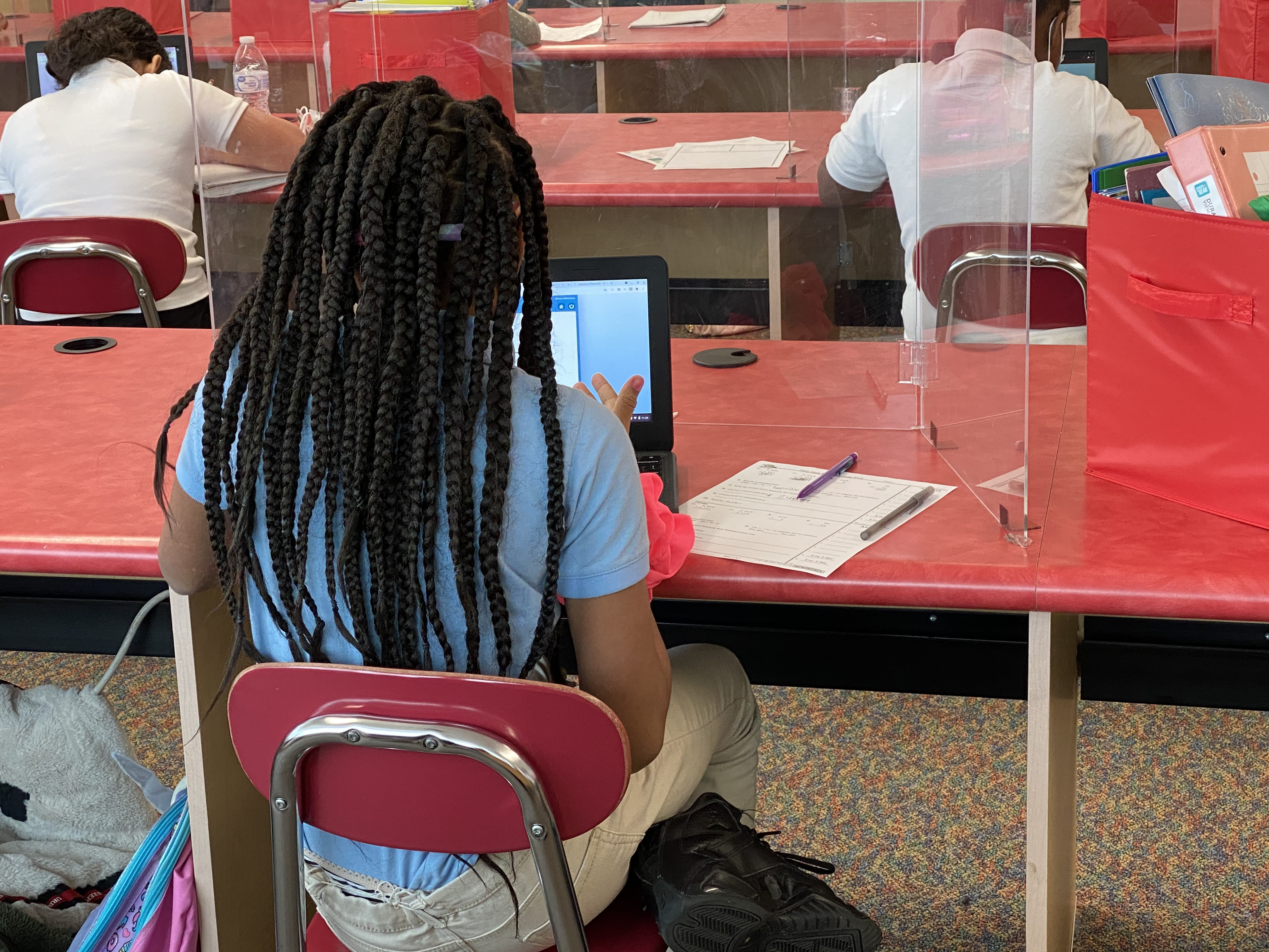 student at computer working