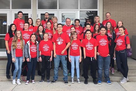 Photo of school staff and students.
