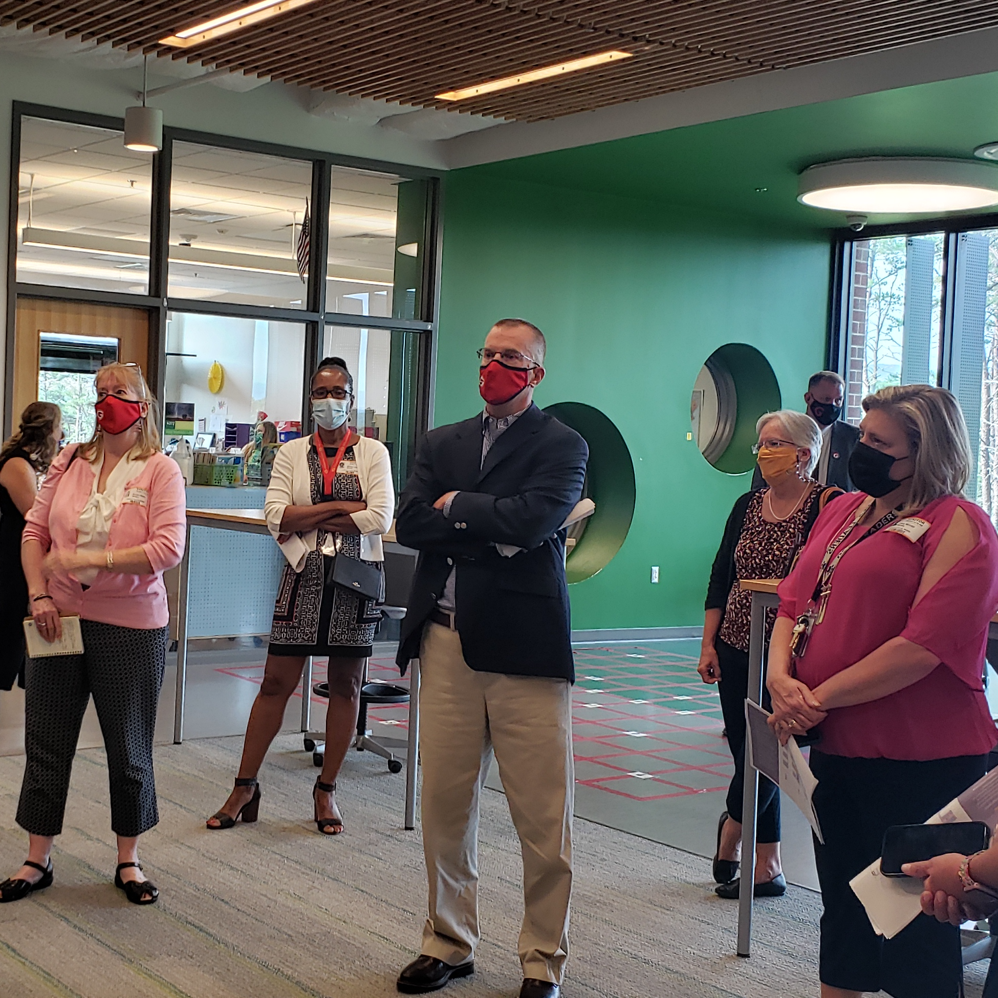 9/8 School Board members and Steering Committee viewing 6th grade shared space (Frederick Co MS)