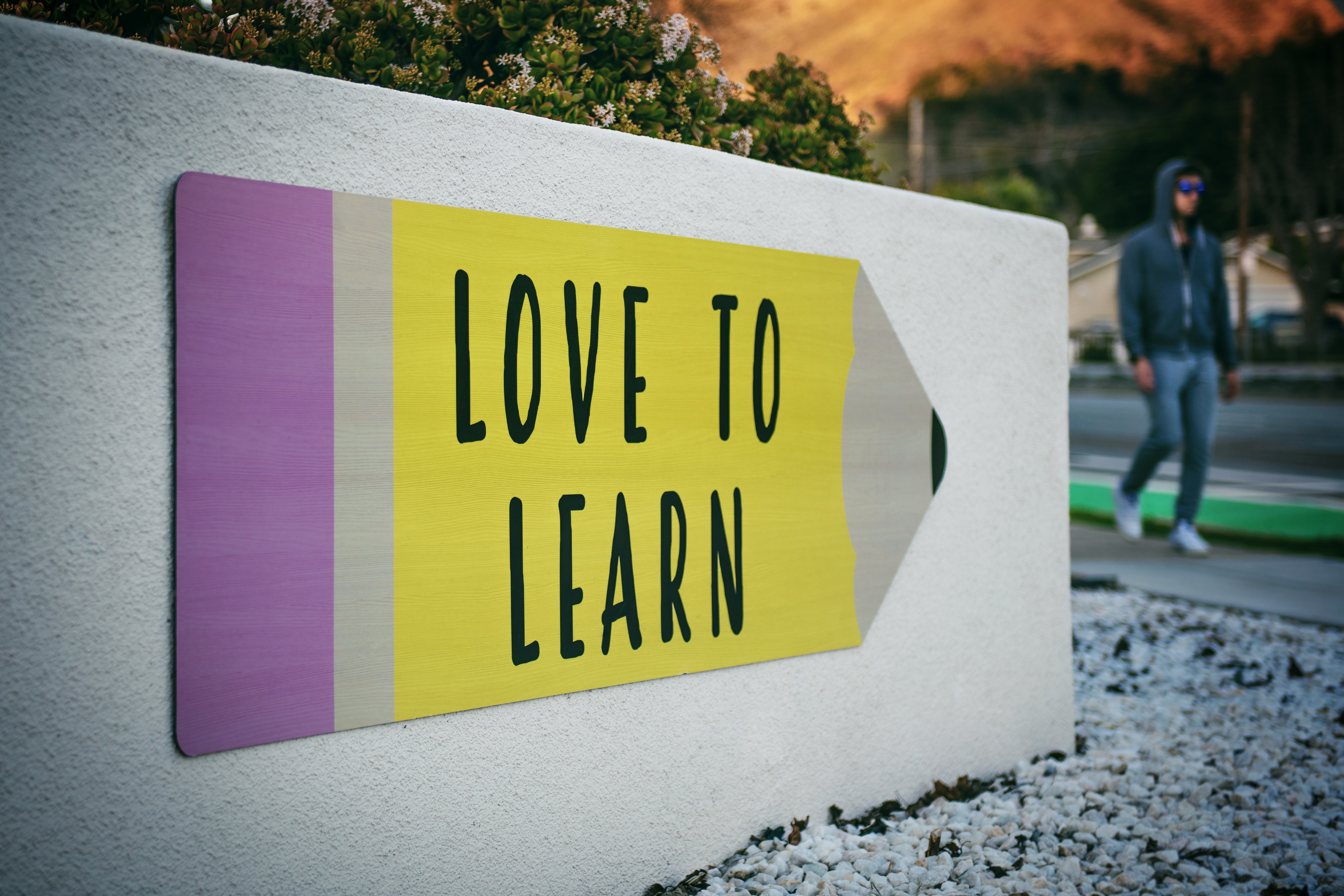 "love to learn" sign