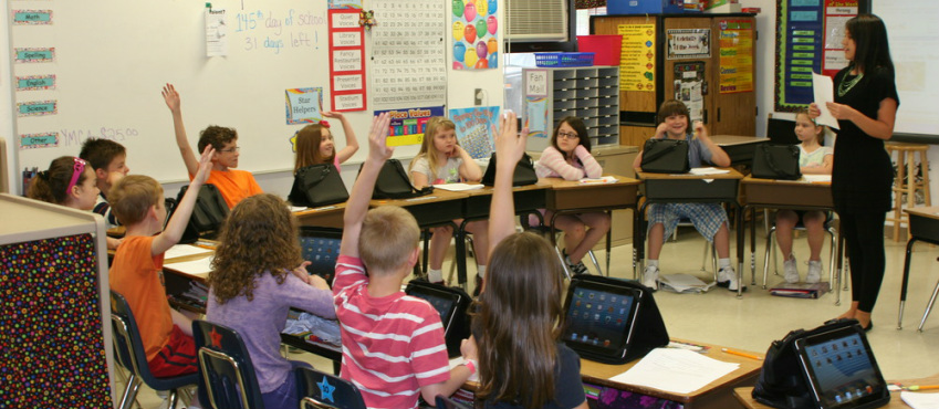 Kids holding up their hands