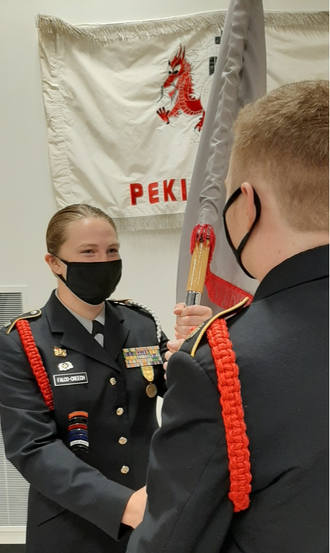 A photo of the Junior Reserve Officers Training Corps in a school gym